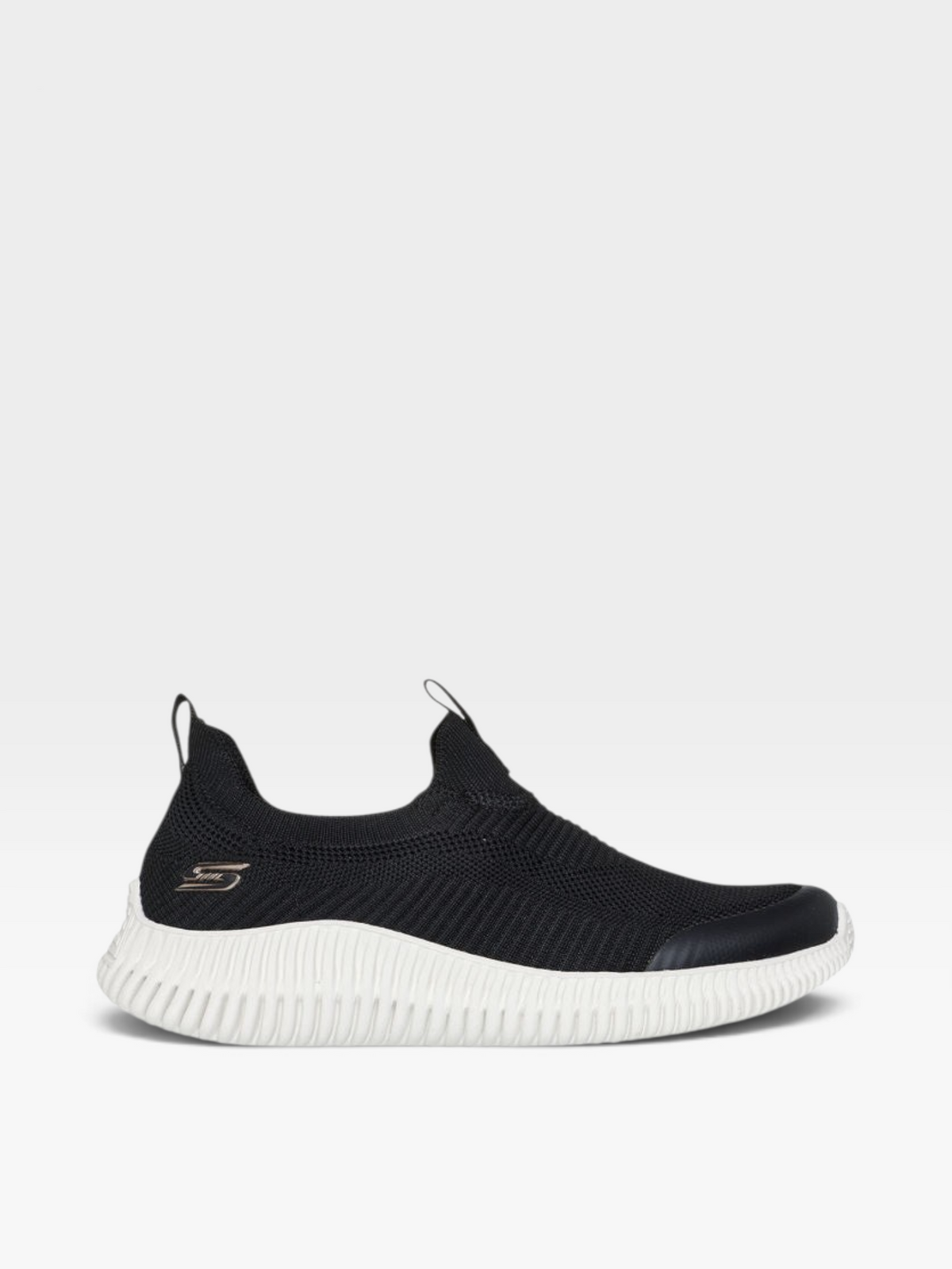 Tenis Skechers para mujer en color negro con suela blanca, disponibles en oklahoma, diseño slip-on con tejido
