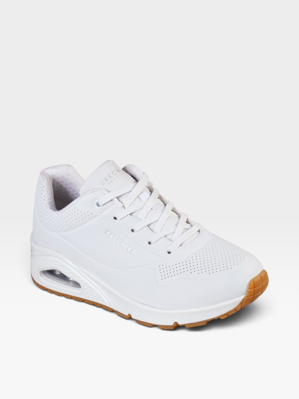 Tenis Skechers Uno blancos para mujer con suela de aire y cuero sintético perforado, disponibles en oklahoma