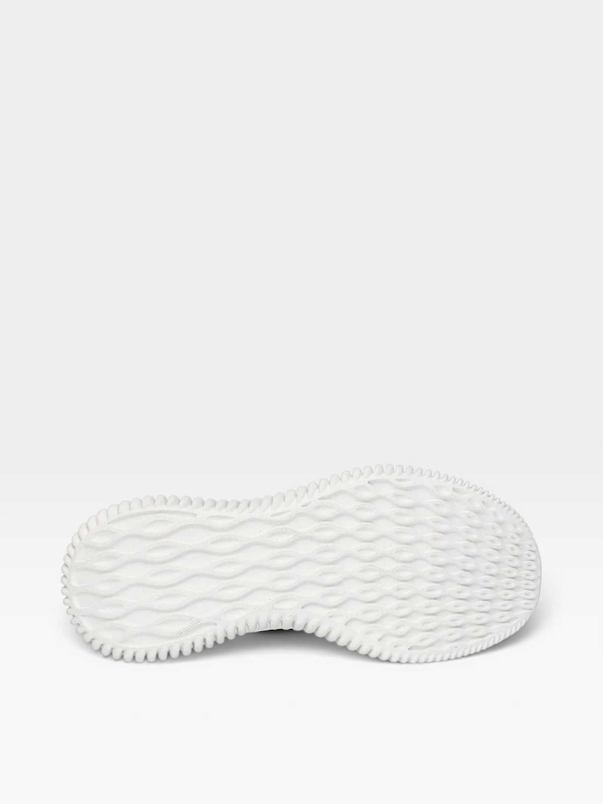 Suela blanca de tenis Skechers con patrón de ondas y textura antideslizante para mayor flexibilidad en oklahoma