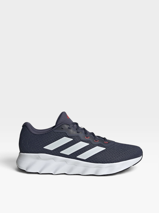Tenis casuales Adidas para hombre en color azul marino con las tres rayas blancas y suela de caucho, de oklahoma