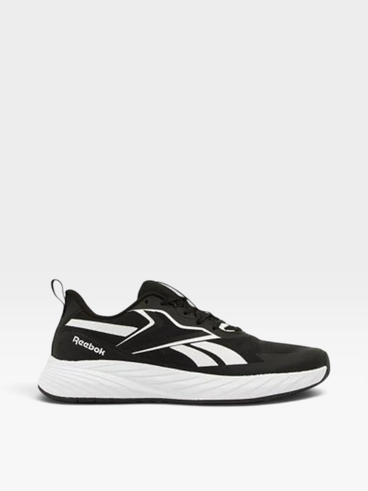 Tenis Reebok Classic negros para hombre con suela blanca, disponibles en la tienda oklahoma