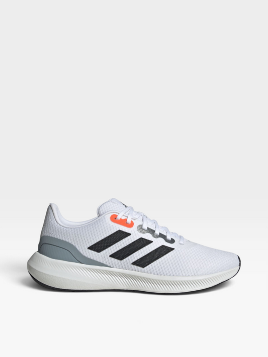 Tenis Adidas Classic blancos para hombre con franjas negras y detalles en naranja, disponibles en oklahoma