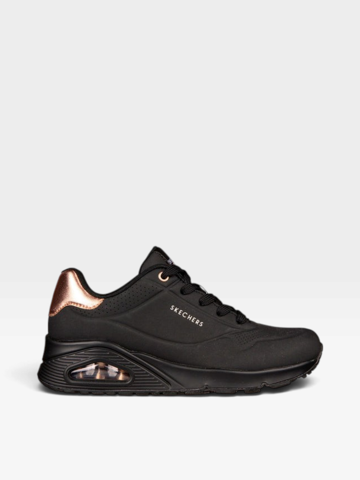 Tenis oklahoma Skechers Uno-Goldenair negros con detalles en oro rosa y suela con cámara de aire visible