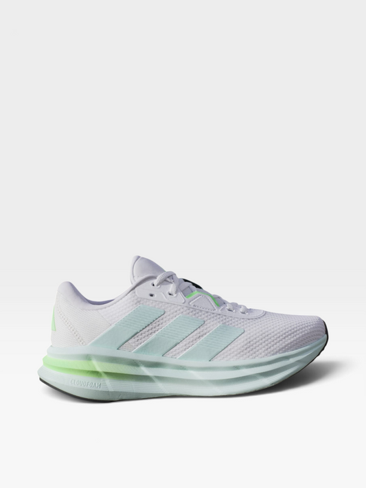 Tenis de running Adidas Galaxy 7 para mujer en color blanco con detalles en verde menta, disponibles en oklahoma