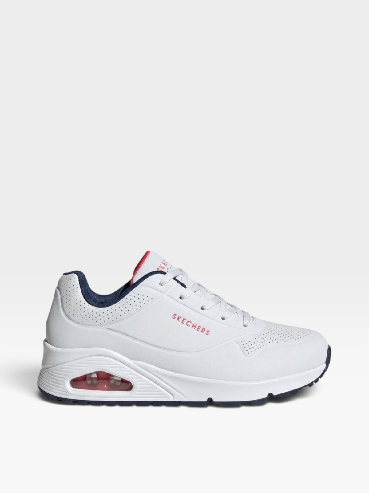 Tenis oklahoma Skechers Uno blancos con detalles en azul marino y rojo, cuero sintético perforado y cámara de aire.